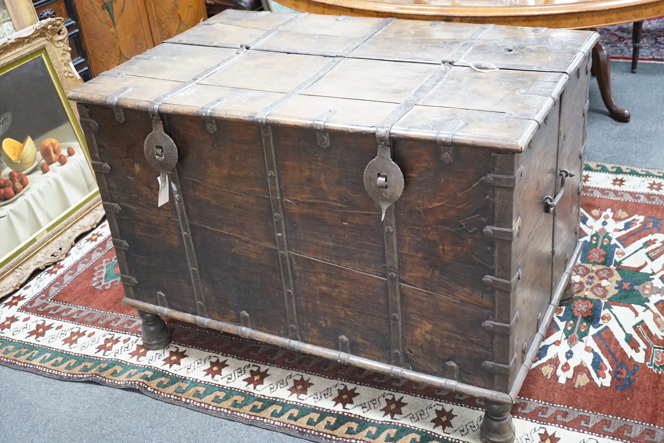 A 19th century Indian iron bound hardwood trunk, width 99cm, depth 64cm, height 70cm